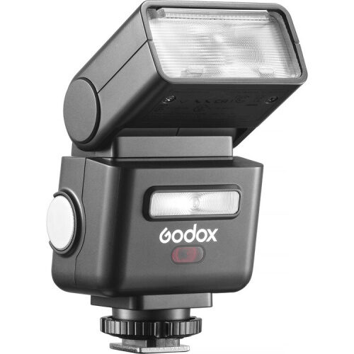 Godox iT32 TTL mini-välk külgvaates üles tõstetud välgupääsuga